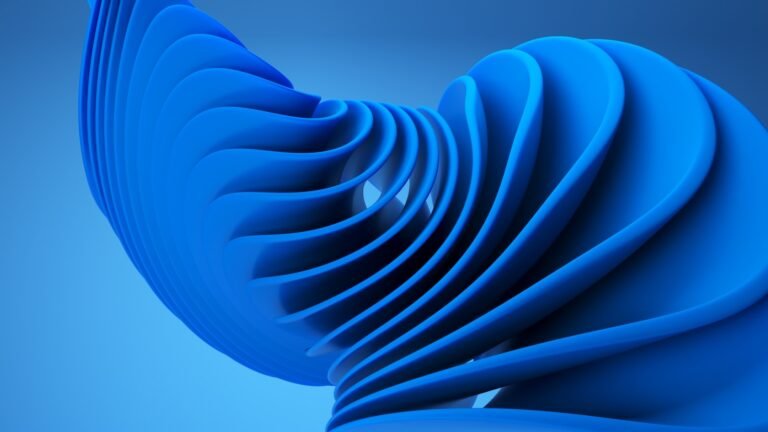 A close up of a blue object with a blurry background