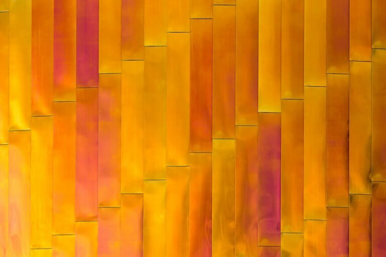 Colorful abstract pattern with vertical planks in yellow and orange hues. Ideal for backgrounds or design projects.