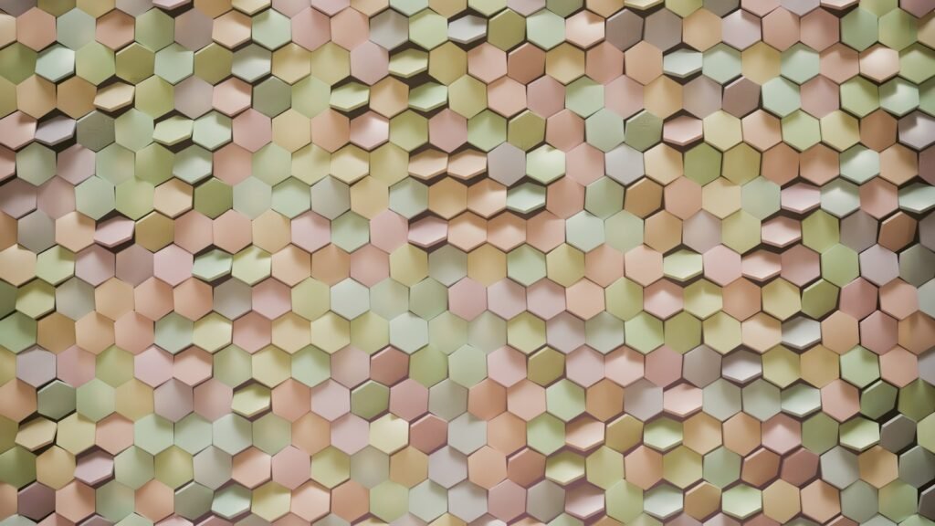 Hexagonal tiles create a colorful, textured background.